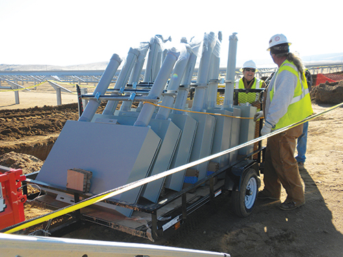 Photo 14. IBEW electricians start DC combiner installation