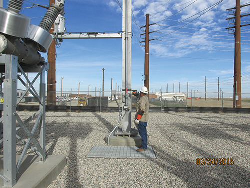 Photo 17. Operator closed medium voltage air switch. Positive component verification was utilized by both operators before closing the switch. 