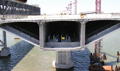 Photo 4. Installing the first 1.6 miles of cable tray and catwalk (SFO Bay Bridge). 