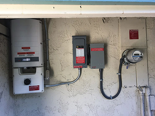 Photo 2. A meter adapter safety switch, attached to an additional safety switch. This is an example of where one disconnecting means could have been sufficient.