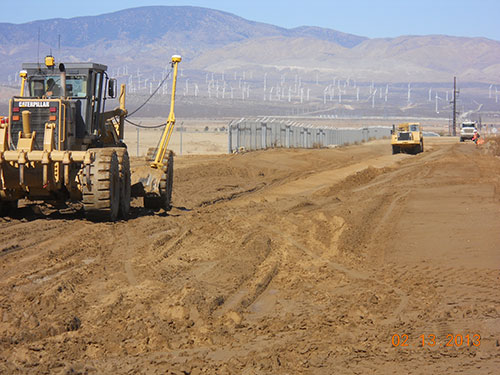 Photo 6A. Grading over an existing 230 kV duct bank.