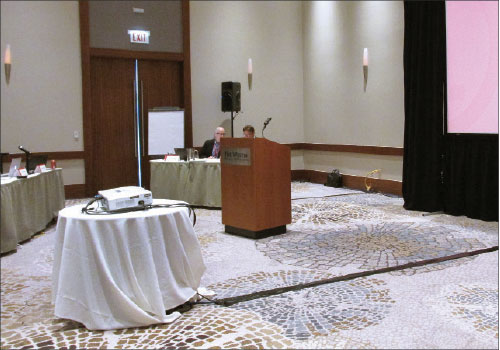 Photo 1. Extension cords taped to the floor are typical for meeting rooms