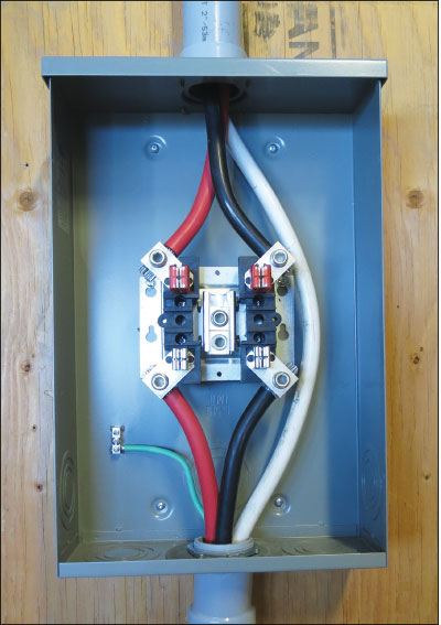 Photo 2. The picture of a meter base with an isolated neutral (not connected to the neutral lugs) to comply with the requirement to limit the system grounding to one location. Note that this now requires a bond conductor between the meter base and the service box. Courtesy of MD ElectricPhoto 2. The picture of a meter base with an isolated neutral (not connected to the neutral lugs) to comply with the requirement to limit the system grounding to one location. Note that this now requires a bond conductor between the meter base and the service box. Courtesy of MD Electric