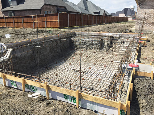 Photo 2. The swimming pool conductive pool shell (belly steel) prior to the installation of concrete.