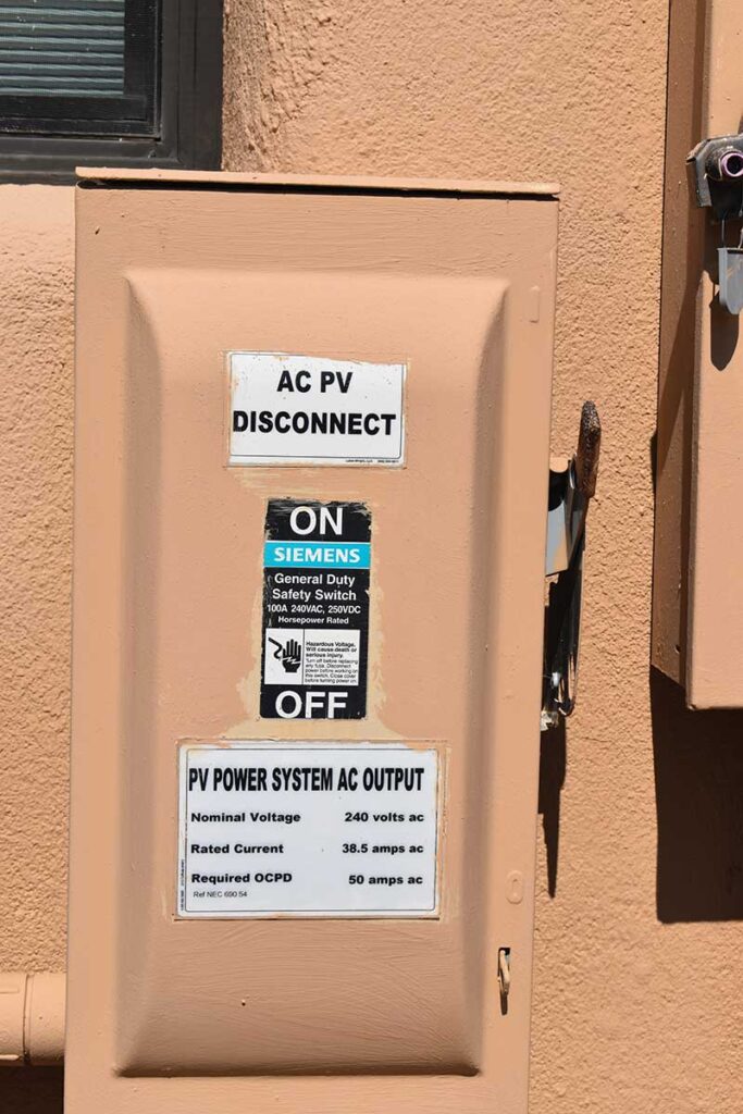 Photo 4. PV system ac disconnect.  Located adjacent to the service disconnect. Courtesy of John Wiles