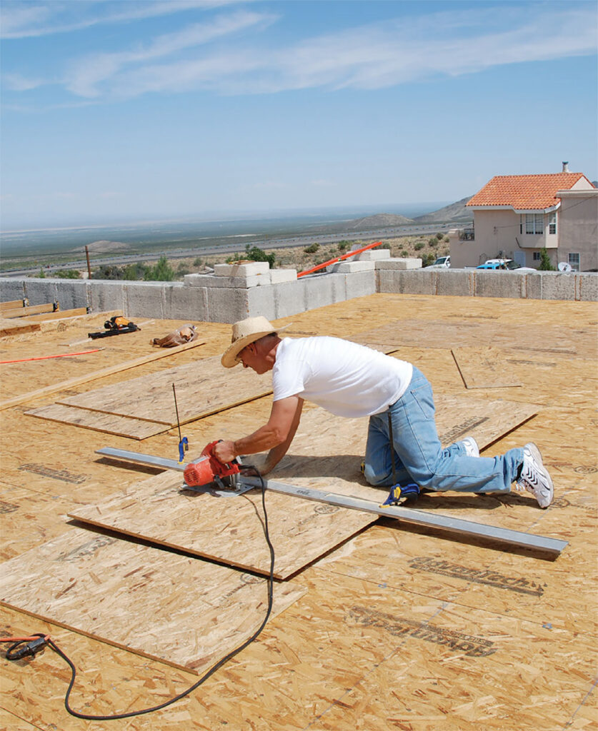 Photo 2. Heavy-duty 5/8” Advantech OSB roofing decking being installed. Courtesy of John Wiles