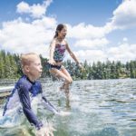 Children playing in lake. It's important to protect against electric shock drowning in lakes