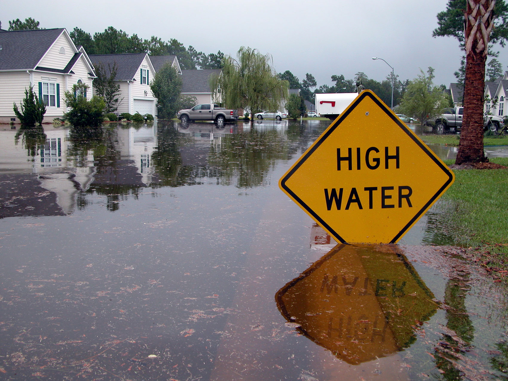 High Water Sign in Flood Damaged area, look for water damaged electrical systems